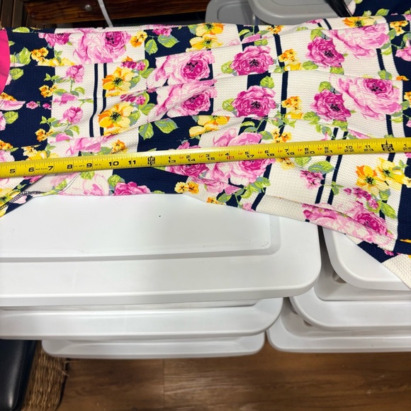 Emma & Michele floral cap-sleeve dress on a navy blue/white striped background. - Picture 12 of 12